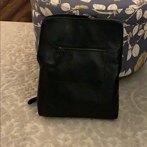 Black faux leather back pack